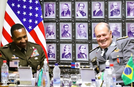 Maj. Gen. William Thigpen (left), Army South commanding general, and Gen. Freire Gomes, Brazilian Army commanding general, share a laugh during a bilateral engagement at the Conference of Americas Armies in Brasilia, Brazil April 20. Brazil was the host nation for the 35th Cycle of the CAA.