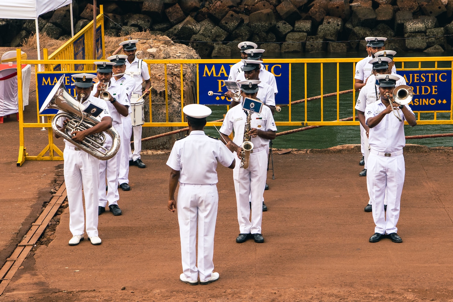 220423-N-TT059-1062 GOA, India (Apr. 23, 2022) A ceremonial band plays for the arrival of the Arleigh Burke-class guided-missile destroyer USS Momsen (DDG 92) in Goa, India for a scheduled port visit. USS Momsen is assigned to Commander, Task Force 71/Destroyer Squadron (DESRON) 15, the Navy's largest forward-deployed DESRON and the U.S. 7th Fleet's principal surface force, and is underway supporting a free and open Indo-Pacific. (U.S. Navy photo by Mass Communication Specialist 3rd Class Lily Gebauer)