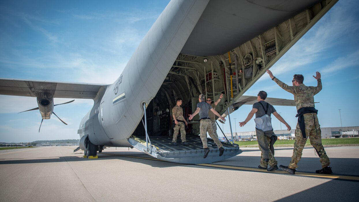 Special Tactics operators assigned to the Kentucky Air National Guard’s 123rd Special Tactics Squadron rehearse their parachute jump exit from a C-130J Super Hercules at Muhammad Ali International Airport in Louisville, Ky., on April 23, 2022, in preparation for a parachute insertion in the Ohio River for the Thunder Over Louisville air show. Members of the squadron kicked off the show by jumping with banners for the United States of America and Kentucky. (U.S. Air National Guard photo by Staff Sgt. Clayton Wear)