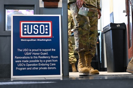 A United Service Organization sign sits outside of the newly renovated United States Air Force Honor Guard resiliency room April, 12, 2022 at Joint Base Anacostia-Bolling, DC. The Air Force Honor Guard is home to over 300 Airmen that utilize the room which is historically furnished by the USO, as a place for ceremonial guardsmen to relax and recover on and off duty hours.  (U.S. Air Force photo by Senior Airman Nilsa Garcia)