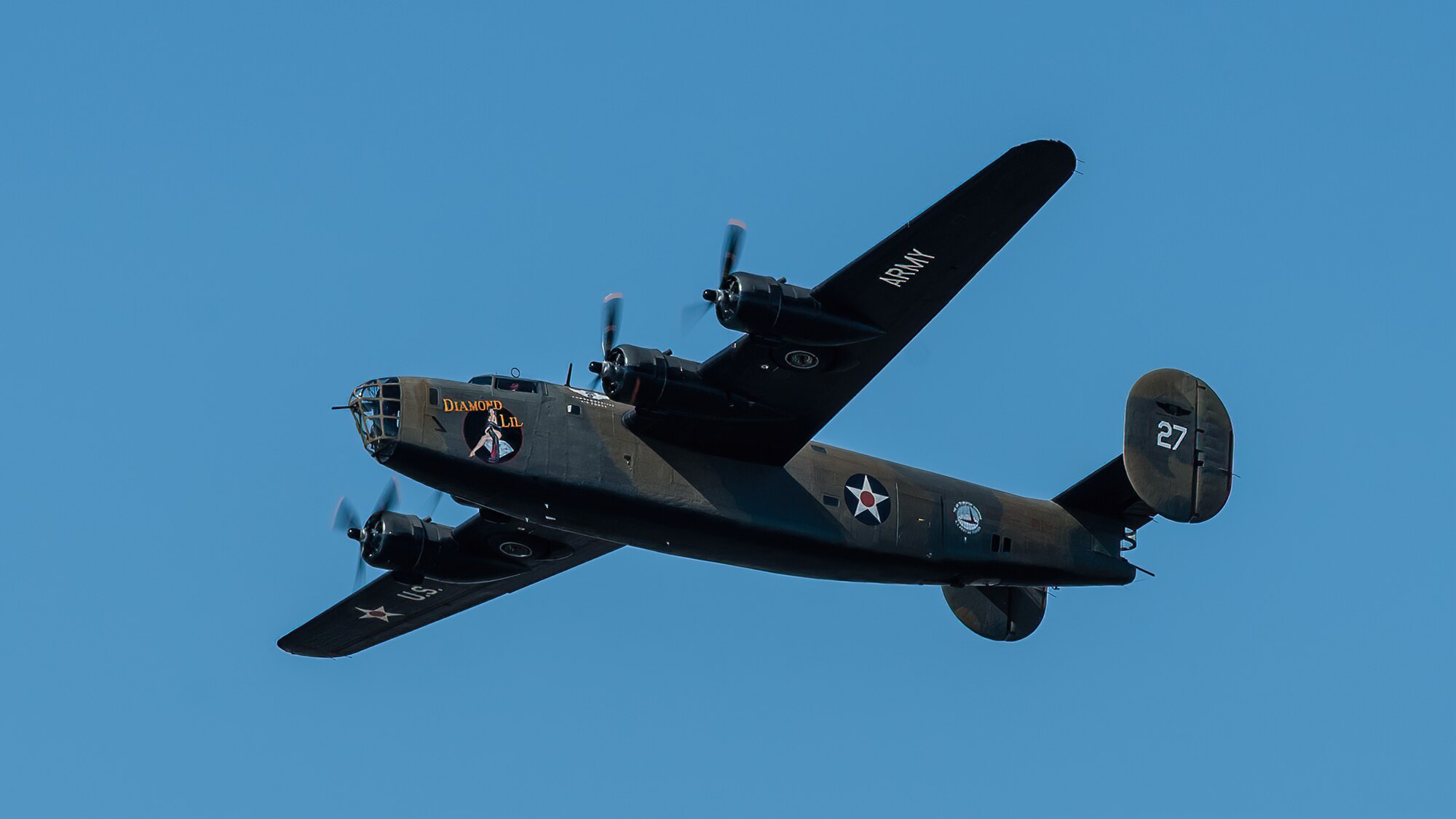 A B-24 Liberator from the Commemorative Air Force performs an aerial demonstration over the Ohio River in downtown Louisville, Ky., April 23, 2022 as part of the Thunder Over Louisville air show. This year’s event celebrated the 75th anniversary of the United States Air Force. (U.S. Air National Guard photo by Dale Greer)