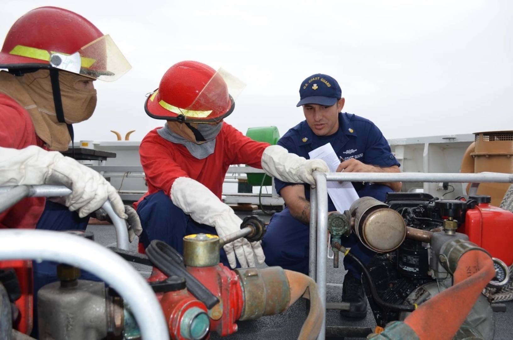 Petty Officer 1st Class Caleb Noriega, of El Paso, Texas, an instructor with the Coast Guard’s Afloat Training Organization, reviews procedures for proper operation of a P-100 dewatering pump with crewmembers from the Coast Guard Cutter Steadfast, a 210-foot medium endurance cutter, during damage control training conducted as part of Command Assessment of Readiness for Training, Sept. 19, 2014. The ATO, part of Force Readiness Command, assesses and prepares shipboard personnel to meet essential operational requirements.