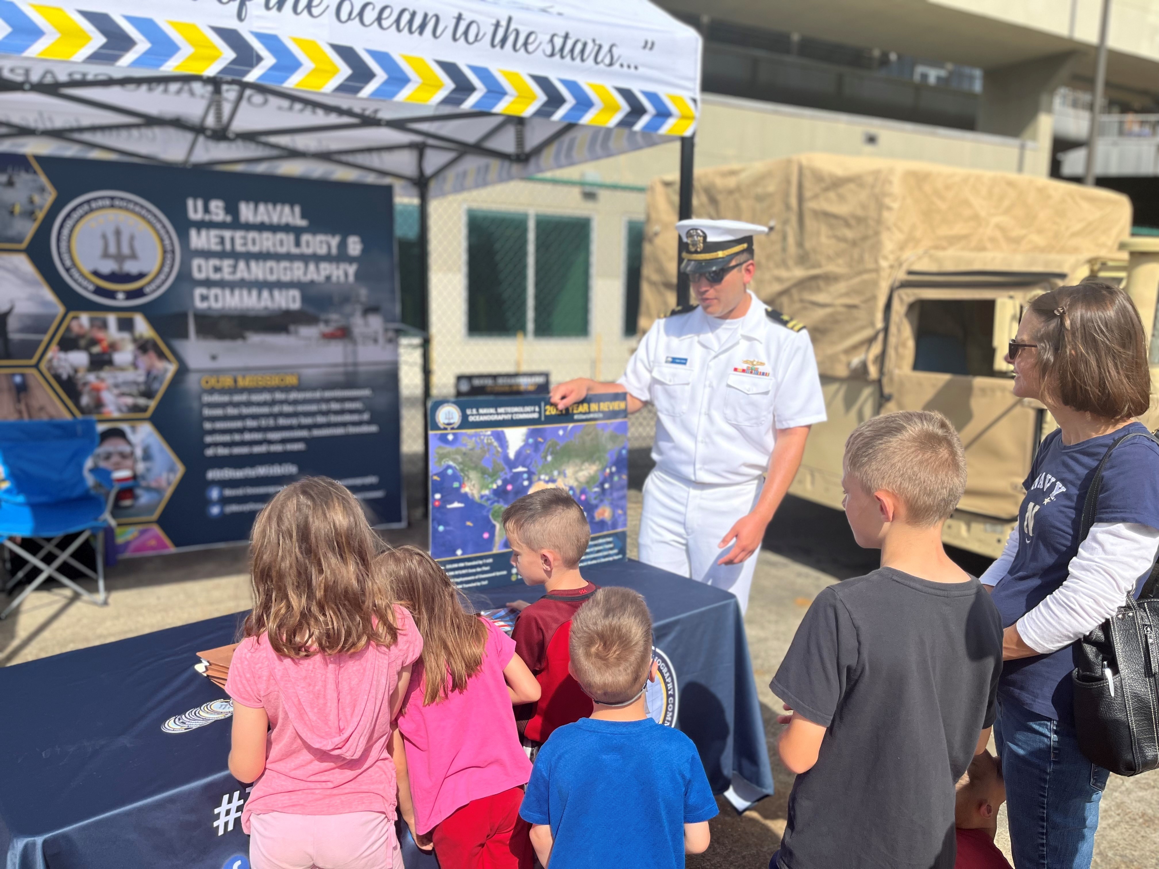 NEW ORLEANS —— The city of New Orleans hosted Navy Week 2022 and U.S. Naval Meteorology & Oceanography Command (Naval Oceanography) attended with a full static display on the Julia Street  pier next to the Arleigh-Burke-class destroyers USS Farragut and USS Lassen, USCG Cutter Daniel Tarr, and French Naval Vessel La Combattante, April 18-22. 

The weeklong series of events kicked-off Monday with a formal press conference attended by the Mayor of New Orleans—RDML Ron Piret, Commander, Naval Meteorology & Oceanography Command—and other U.S. Navy and Coast Guard commanders.