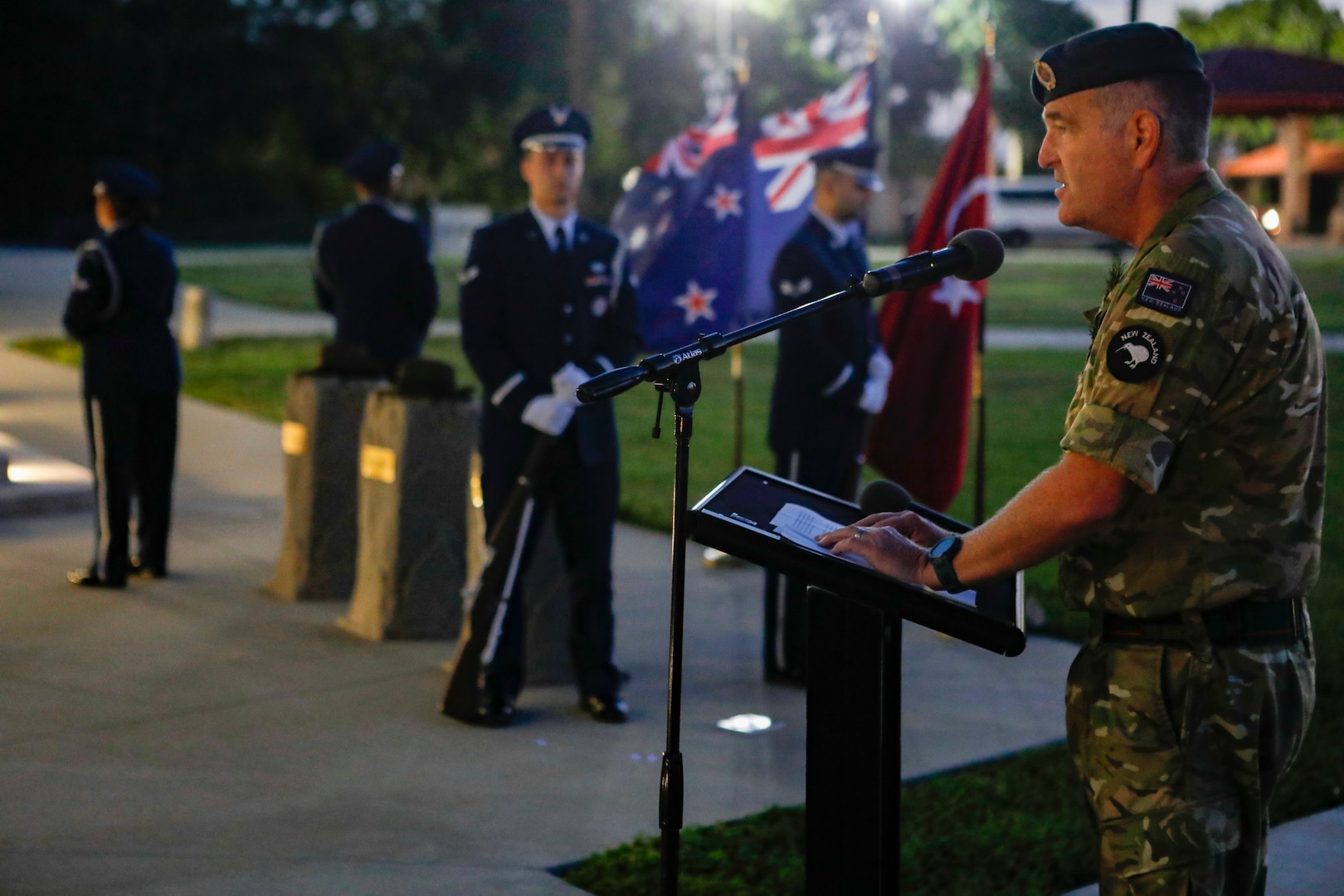 TAMPA, Fla. – New Zealand Army Lt. Col. Jason Hutchings, a senior national representative (SNR) at U.S. Central Command, addresses attendees during an ANZAC Day dawn service at MacDill Air Force Base, April 25, 2022. Though repelled by Ottoman forces, Australian and New Zealand Army Corps (ANZAC) Day commemorates the World War I campaign when Australian and New Zealand forces stood together in effort to capture the Gallipoli Peninsula. ANZAC Day is a day of remembrance in Australia and New Zealand to honor those who served and died in military operations. (U.S. Central Command Public Affairs photo by Tom Gagnier)