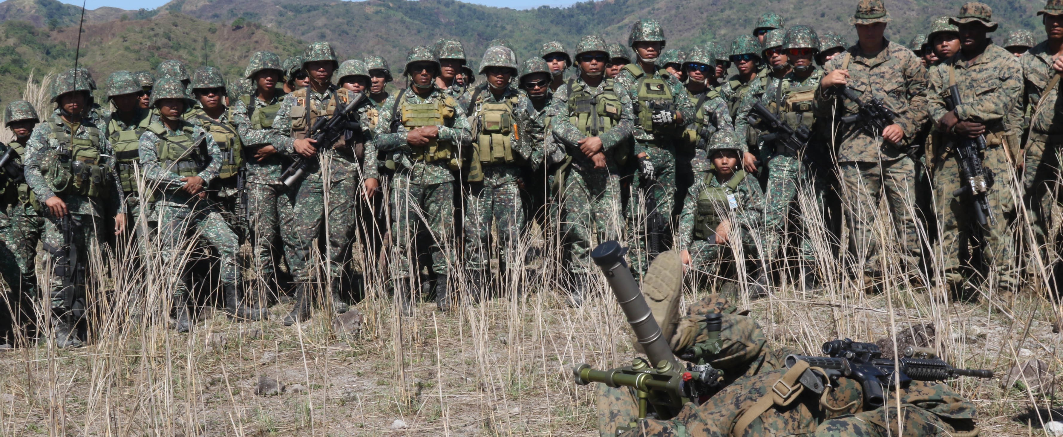 Marines lined up in uniform facing the camera