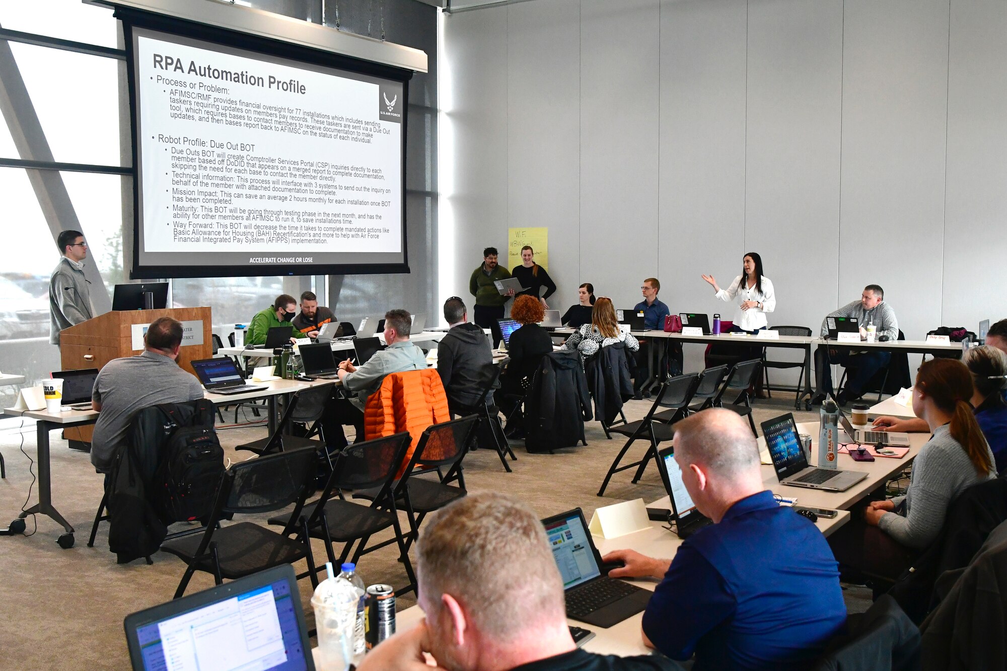 Students during an RPA roadshow training seminar April 14, 2022, at the Weber Basin Water Conservation District. The software produced by UiPath is intended increase workflow efficiency by automating repetitive tasks. (U.S. Air Force photo by Todd Cromar)