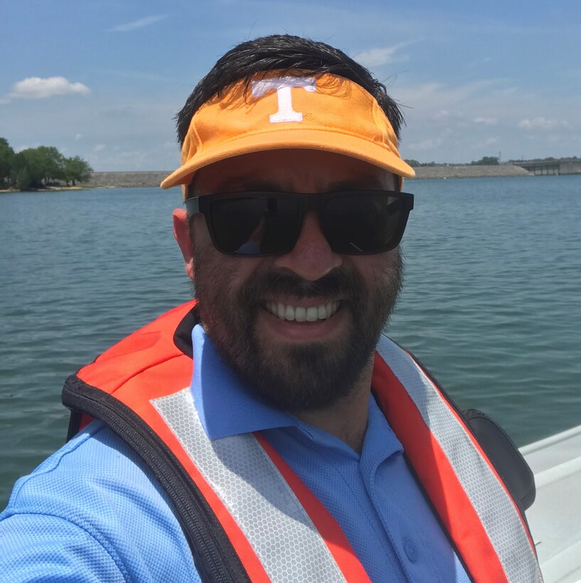 David Bogema assists with routine water quality sampling on the waters of J. Percy Priest Lake in July 2019. (USACE photo by David Bogema)