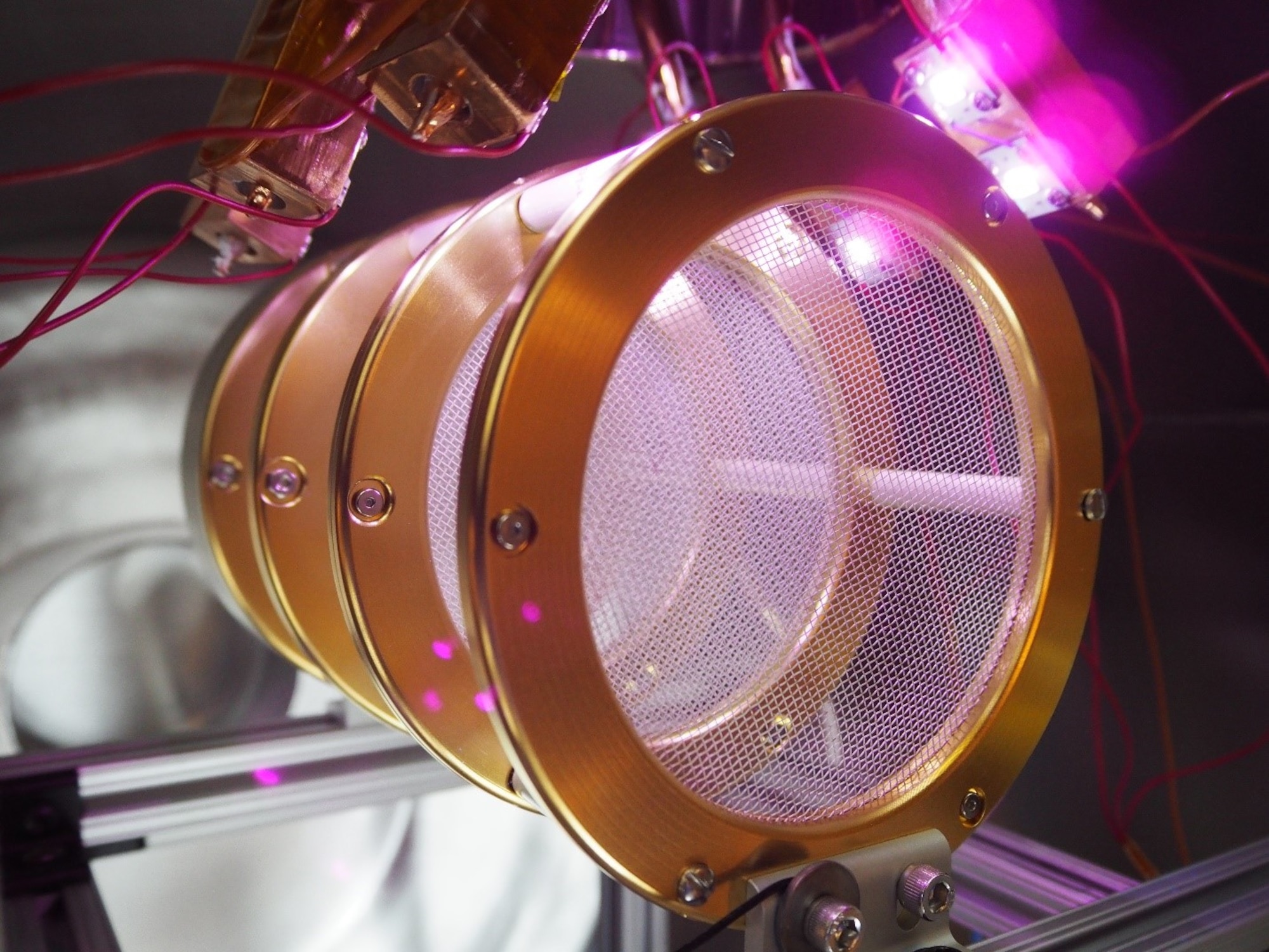 The multi-energy electron source undergoes testing in a vacuum chamber at the Air Force Research Laboratory Space Vehicles Directorate’s Spacecraft Charging and Instrument Calibration Laboratory at Kirtland Air Force Base, N.M.