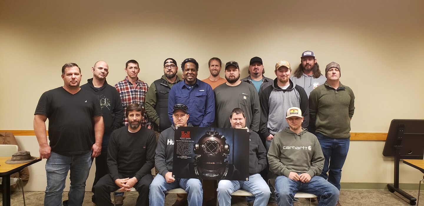several men standing together for a photo