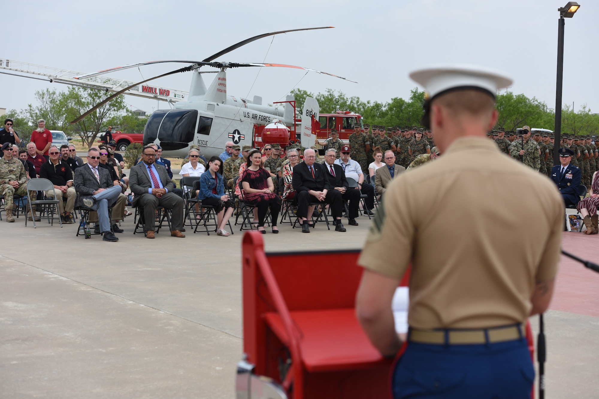 U.S. Marine Corps Sgt. Nicholas Spitzer, 312th Training Squadron instructor, speaks during the annual Department of Defense Fallen Firefighter Memorial Service, Goodfellow Air Force Base, Texas, April 22, 2022. Five fallen firefighters were memorialized during the ceremony. (U.S. Air Force photo by Senior Airman Michael Bowman)