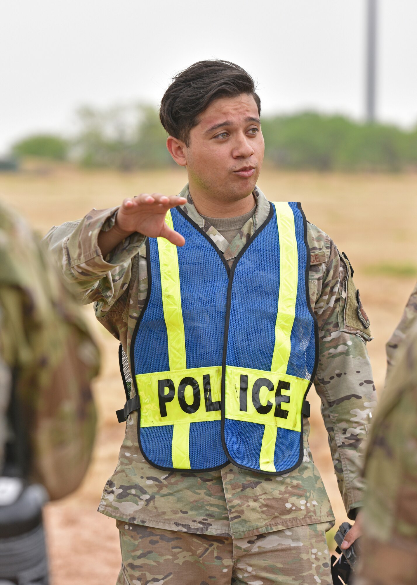 A 17th Training Wing member gives feedback during the Angelo State University Reserve Officers’ Training Corps field training exercise at Goodfellow Air Force Base, Texas, April 22, 2022. Members from the 17th Security Forces Squadron volunteered to work side by side with cadets to give them directions and feedback throughout the exercise. (U.S. Air Force photo by Senior Airman Ashley Thrash)