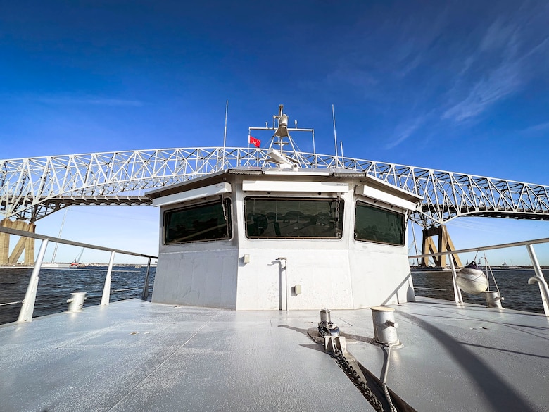 The U.S. Army Corps of Engineers, Baltimore District’s CATLETT navigates past the Francis Scott Key Bridge to perform a hydrographic survey at the Craighill Channel near Annapolis, Md., April 20, 2022. The District’s Survey team mobilized to the Chesapeake Bay to determine if sediments impacted the federal channel, resulting from the box ship EVER FORWARD’s recent grounding incident and successful refloating operations. (U.S. Army photo by Greg Nash)