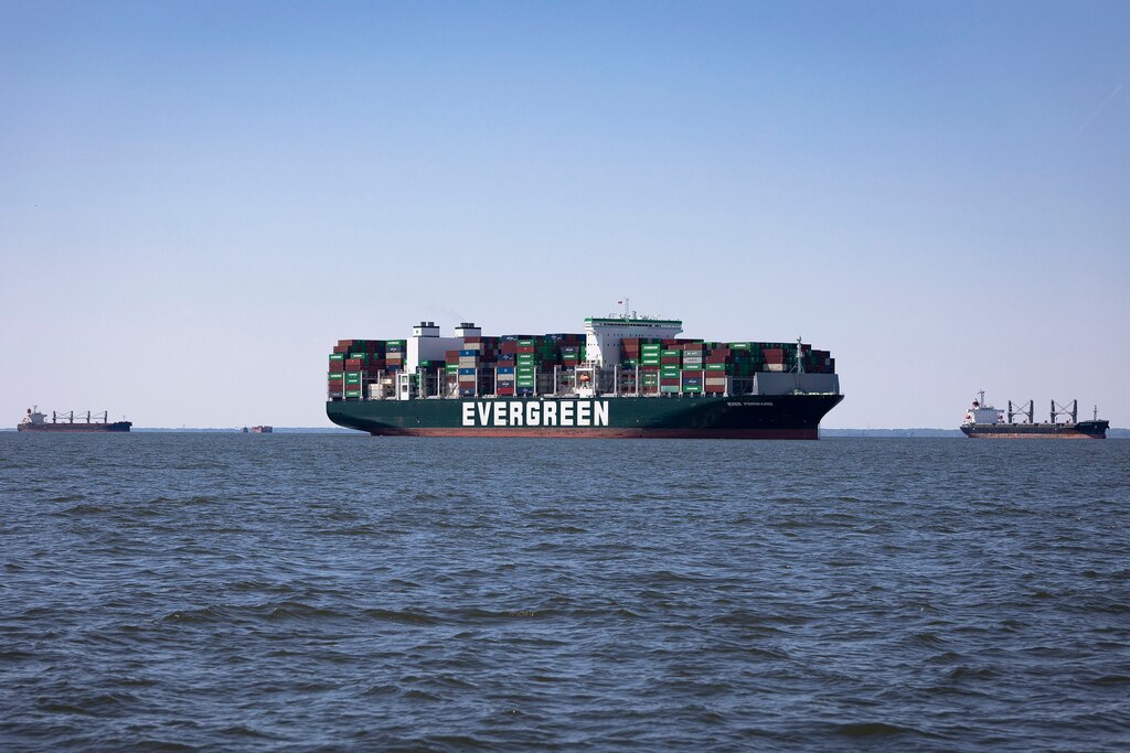 The Taiwanese vessel operator Evergreen’s box ship EVER FORWARD sits grounded in the Chesapeake Bay outside the Craighill Channel near Annapolis, Md., April 20, 2022. The box ship ran aground in the Chesapeake Bay March 13, 2022, and recently underwent refloating operations and had 550 containers offloaded. Most recently, navigational crews successfully pushed the massive container ship from the mud. Moving forward, material dredged from the site will beneficially be used for rebuilding and restoring Poplar Island, home to hundreds of species of wildlife and waterfowl, as approved by Maryland’s Department of the Environment. (U.S. Army photo by Greg Nash)