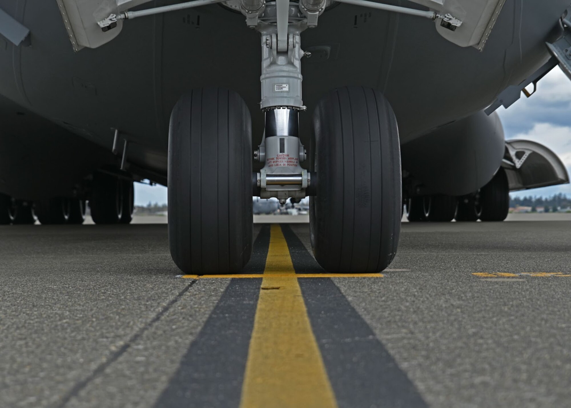 A U.S. Air Force C-17 Globemaster III prepares for take off at Joint Base Lewis-McChord, Washington, April 21, 2022. This C-17 was marshaled out by Airmen participating in the week-long Agile Combat Employment training hosted by the 62nd Maintenance Group. (U.S. Air Force photo by Airman 1st Class Callie Norton)