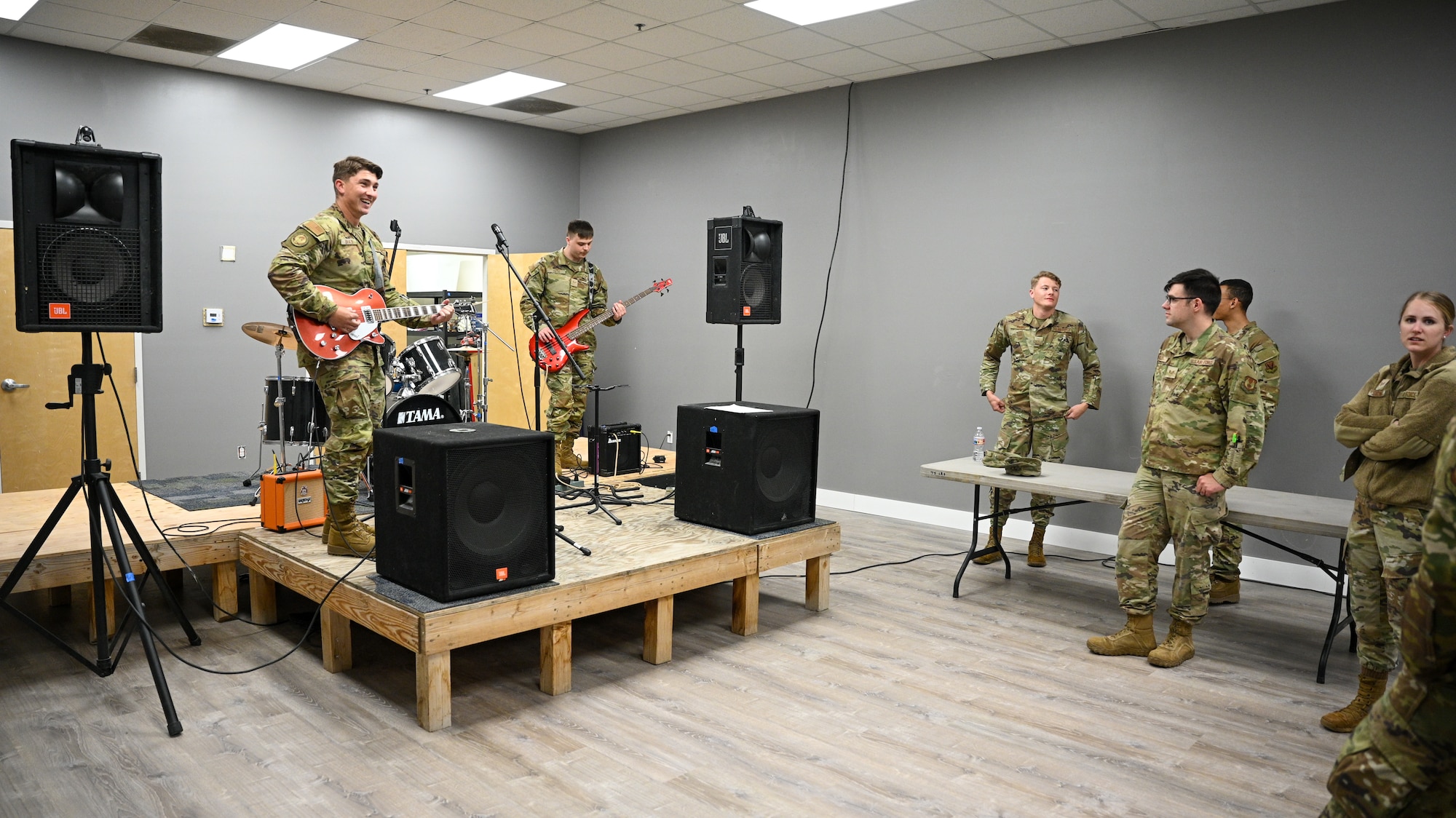Left, Senior Airman Bailey Brazil, 309th Aircraft Maintenance Group, and Senior Airman Vincent Toth, 421st Fighter Generation Squadron, play music during a grand opening of the Airman Recreation Center at Hill Air Force Base, Utah.