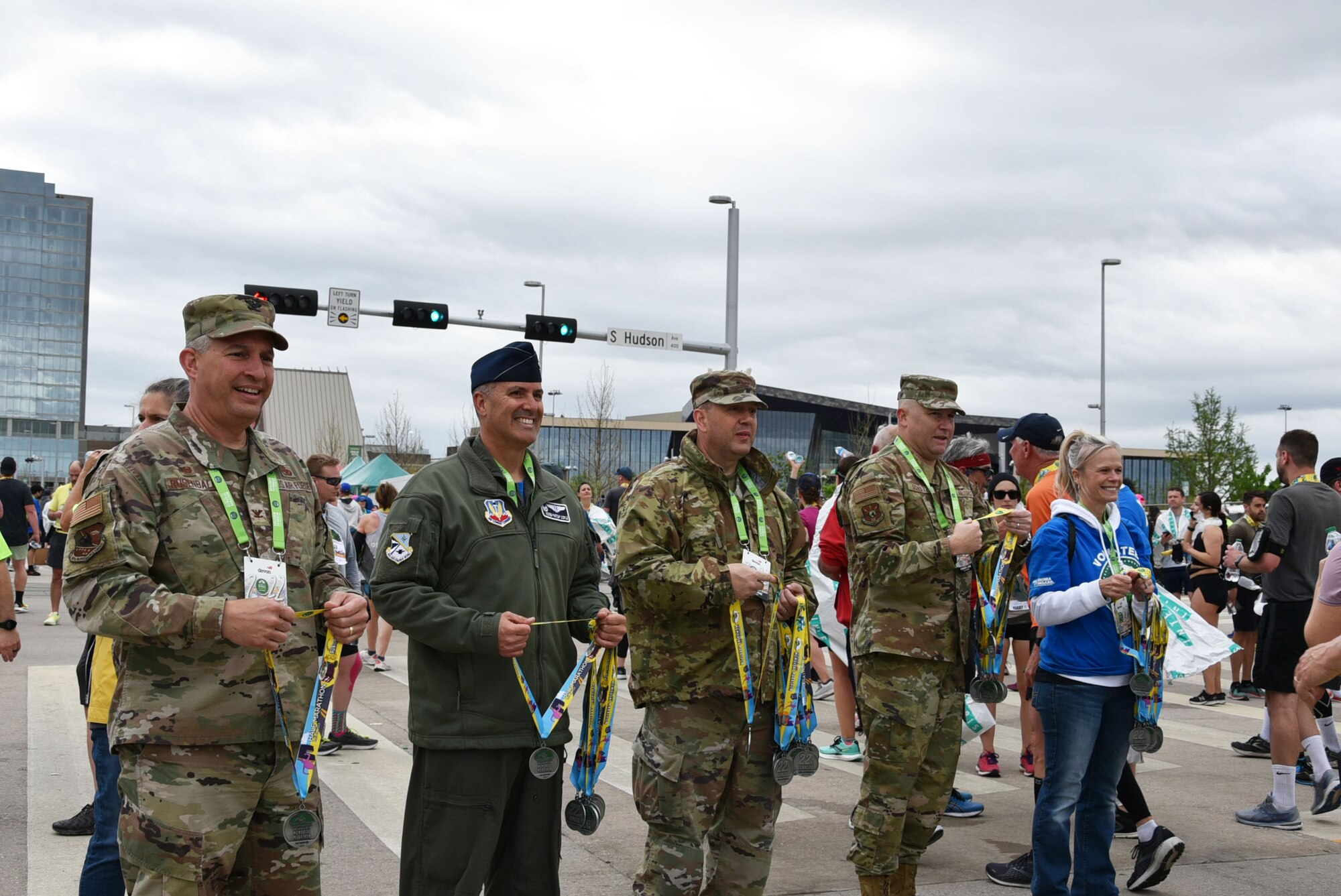 Tinker Air Force Base senior leaders handed out medals to runners at the finish line of the Oklahoma City Memorial Marathon April 24, 2022.