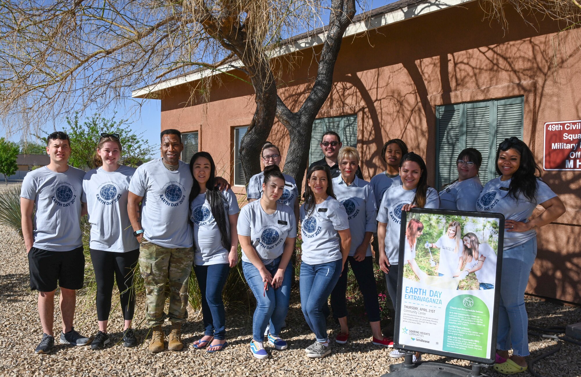 Members of the Holloman Resident Council and the Soaring Heights Communities team celebrate Earth Day on Holloman Air Force Base, New Mexico, April 21, 2022. Holloman’s privatized housing company, Soaring Heights Communities, sponsored a community clean-up in efforts to be environmentally conscious residents of the base. (U.S. Air Force Base photo by Airman 1st Class Antonio Salfran)