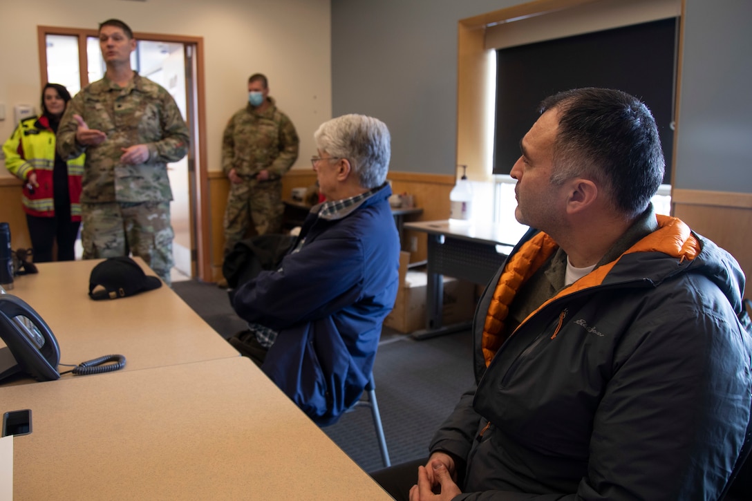 Lt. Col. Eric Marcellus, Joint Task Force Commander-Nome, briefs Larry Pederson, front, Bering Straits Native Cooperation, Vice President of Nome Operations, and Glenn Steckman, city manager, in Nome, Alaska, Mar. 2. Exercise Arctic Eagle-Patriot 2022 increases the National Guard’s capacity to operate in austere, extreme cold-weather environments across Alaska and the Arctic region. AEP22 enhances the ability of military and civilian inter-agency partners to respond to a variety of emergency and homeland security missions across Alaska and the Arctic. (Alaska National Guard photo by Victoria Granado)