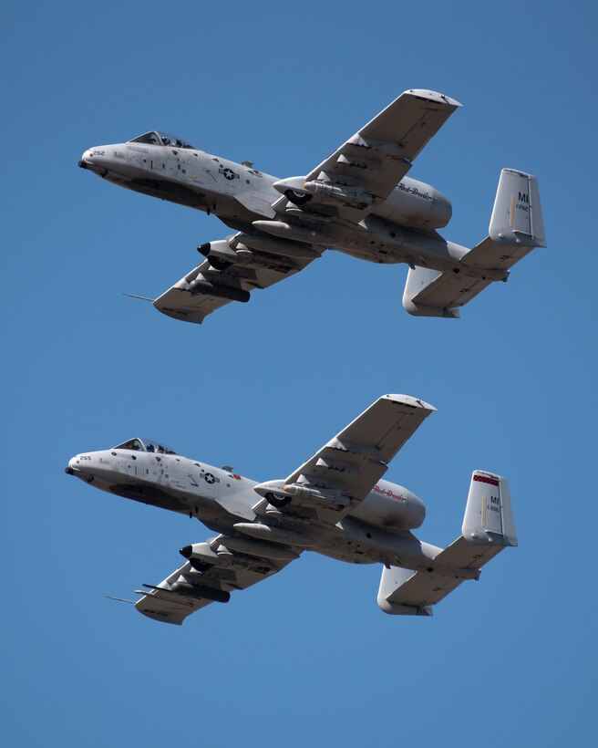 A pair of U.S. Air Force A-10C Thunderbolt IIs from the 107th Fighter Squadron at Selfridge Air National Guard Base, Mich., performs an aerial demonstration over the Ohio River in downtown Louisville, Ky., April 23, 2022 as part of the Thunder Over Louisville air show. This year’s event celebrated the 75th anniversary of the United States Air Force. (U.S. Air National Guard photo by Dale Greer)