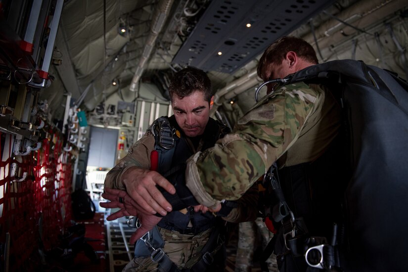 Tech. Sgt. Ryan Penne, a pararescueman with the Kentucky Air National Guard’s 123rd Special Tactics Squadron, checks his teammate’s altimeter at Muhammad Ali International Airport in Louisville, Ky., on April 23, 2022, in preparation for a parachute insertion in the Ohio River for the Thunder Over Louisville air show. Squadron members kicked off the show by jumping with banners for the United States of America and Kentucky. (U.S. Air National Guard photo by Staff Sgt. Clayton Wear)