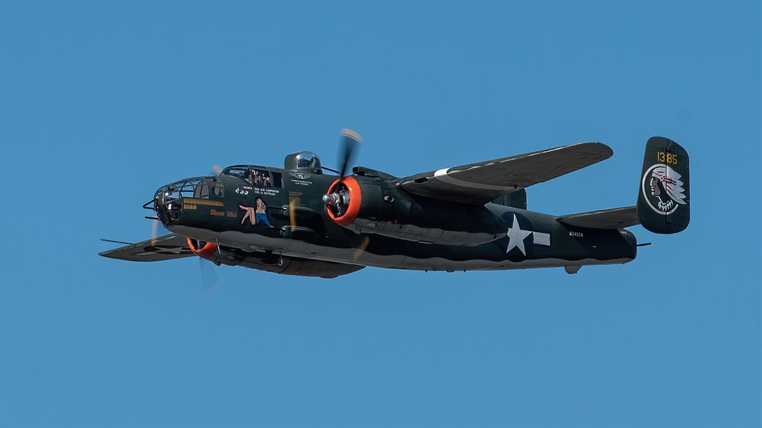 A B-25 Mitchell from the Commemorative Air Force performs an aerial demonstration over the Ohio River in downtown Louisville, Ky., April 23, 2022 as part of the Thunder Over Louisville air show. This year’s event celebrated the 75th anniversary of the United States Air Force. (U.S. Air National Guard photo by Dale Greer)