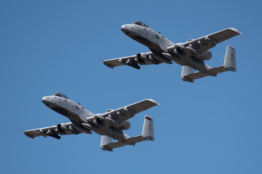 A pair of U.S. Air Force A-10C Thunderbolt IIs from the 107th Fighter Squadron at Selfridge Air National Guard Base, Mich., performs an aerial demonstration over the Ohio River in downtown Louisville, Ky., April 23, 2022 as part of the Thunder Over Louisville air show. This year’s event celebrated the 75th anniversary of the United States Air Force. (U.S. Air National Guard photo by Dale Greer)