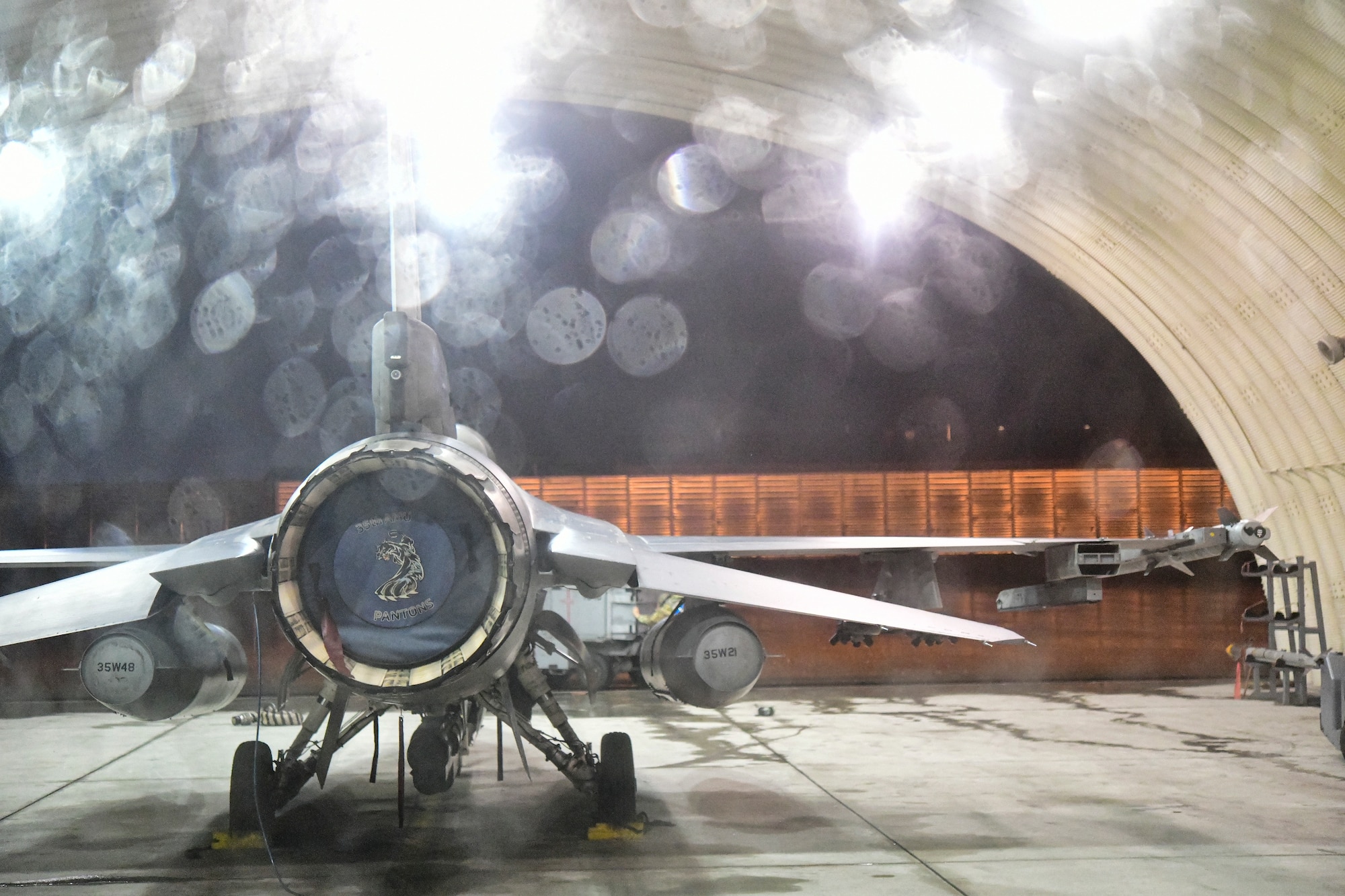 Thunderstorm rain falls over aircraft flows during routine training at Kunsan Air Base, Republic of Korea, April 25, 2022.