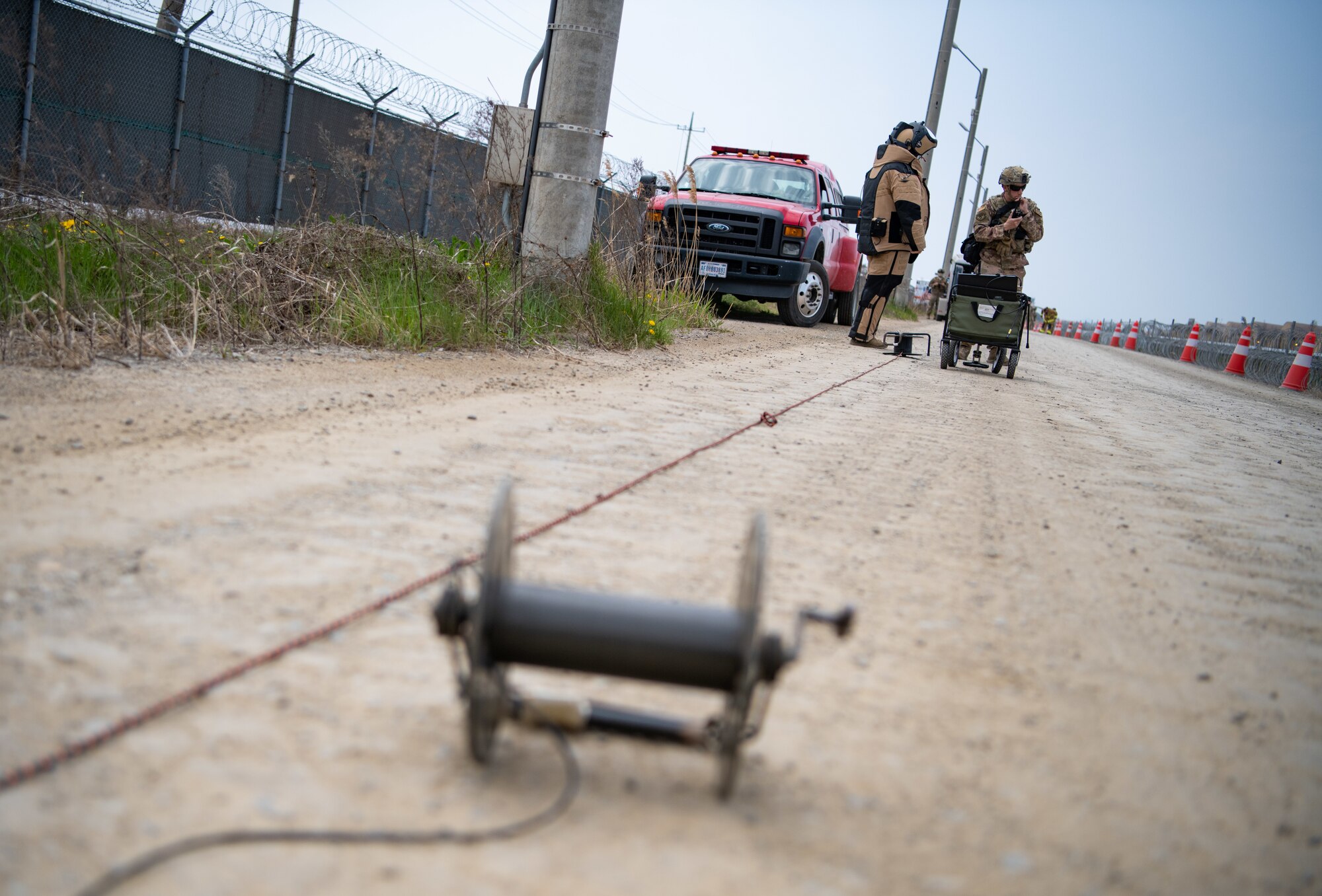 8th Civil Engineer Squadron Explosive Ordnance Disposal (EOD), responds to a vehicle with a suspected explosive during a training event at Kunsan Air Base, Republic of Korea, April 22, 2022.