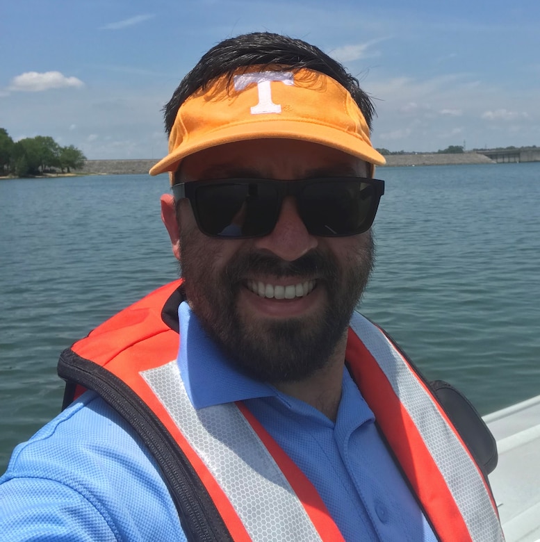 David Bogema assists with routine water quality sampling on the waters of J. Percy Priest Lake in July 2019. (USACE photo by David Bogema)