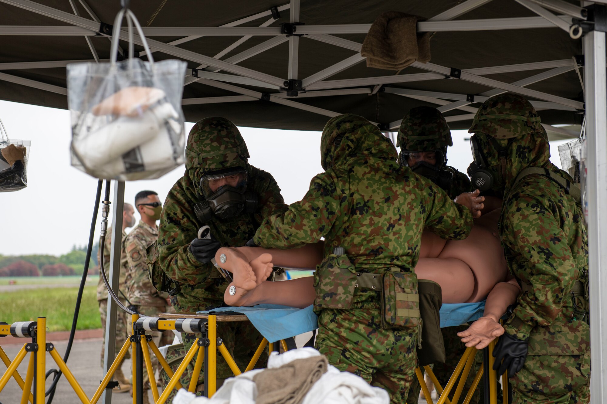 Japan Ground Self-Defense Force Central Biological Chemical Weapons Defense Unit soldiers demonstrate decontamination procedures
