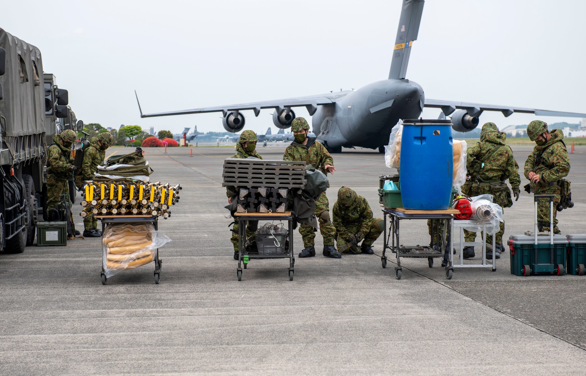 Japan Ground Self-Defense Force Central Biological Chemical Weapons Defense Unit soldiers prepare to demonstrate their capabilities