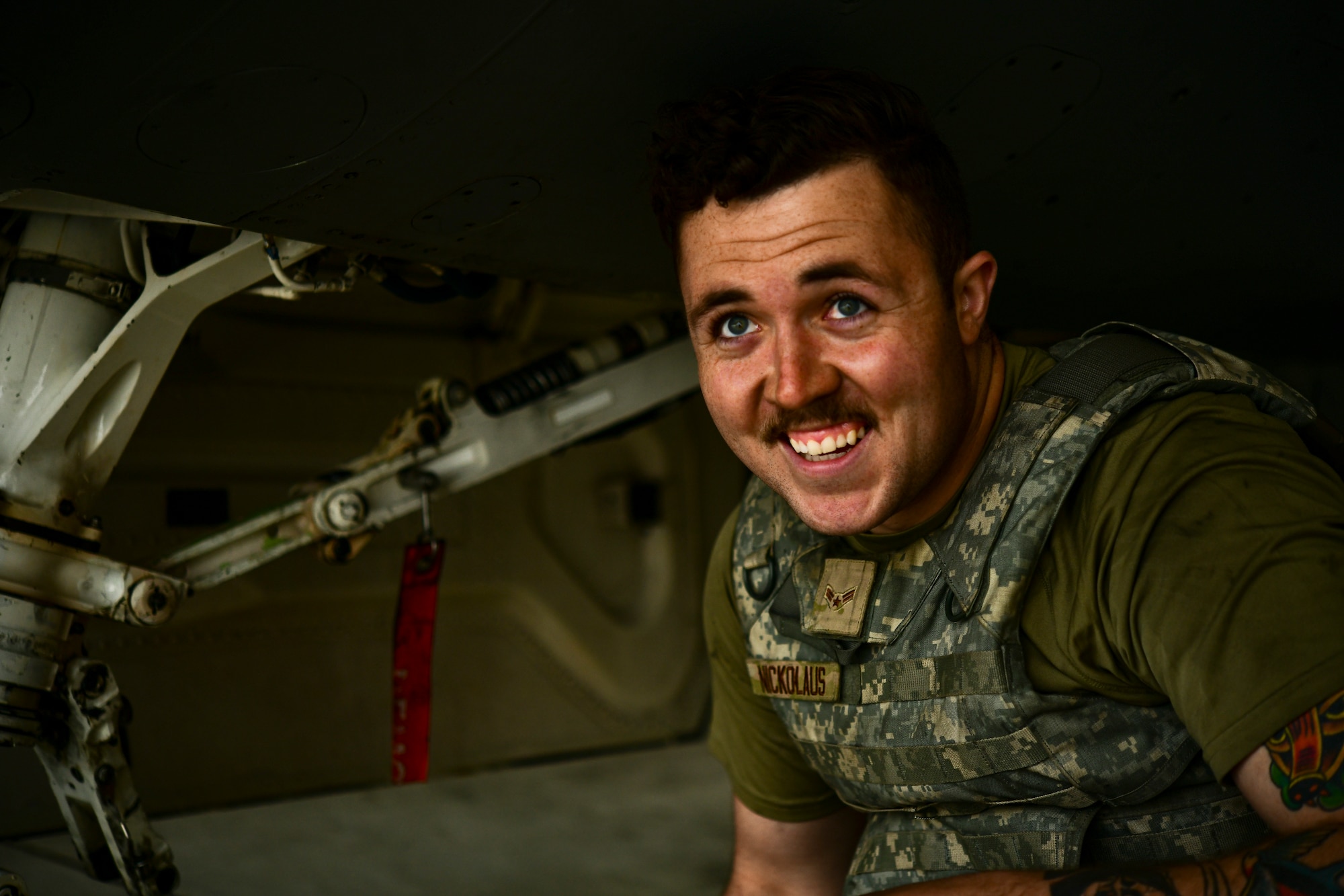 Flight line portraits of weapons and maintenance Airmen.