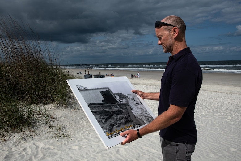 Matthew Schrader, a coastal engineer and planner with the U.S. Army Corps of Engineers (USACE), Jacksonville District has worked and played on most of the 1,350 miles that make up the Florida coast. As we stood at the Seventh Street entrance of the beach, he showed me an old-timey black and white photo taken after Hurricane Dora in 1964 that he had enlarged of that very same spot. Juxtaposing the image to what the beach looks like now encapsulates the importance of working with nature to find sustainable solutions for our everyday problems. (U.S. Army Corps of Engineers Photo by Brigida I. Sanchez)
