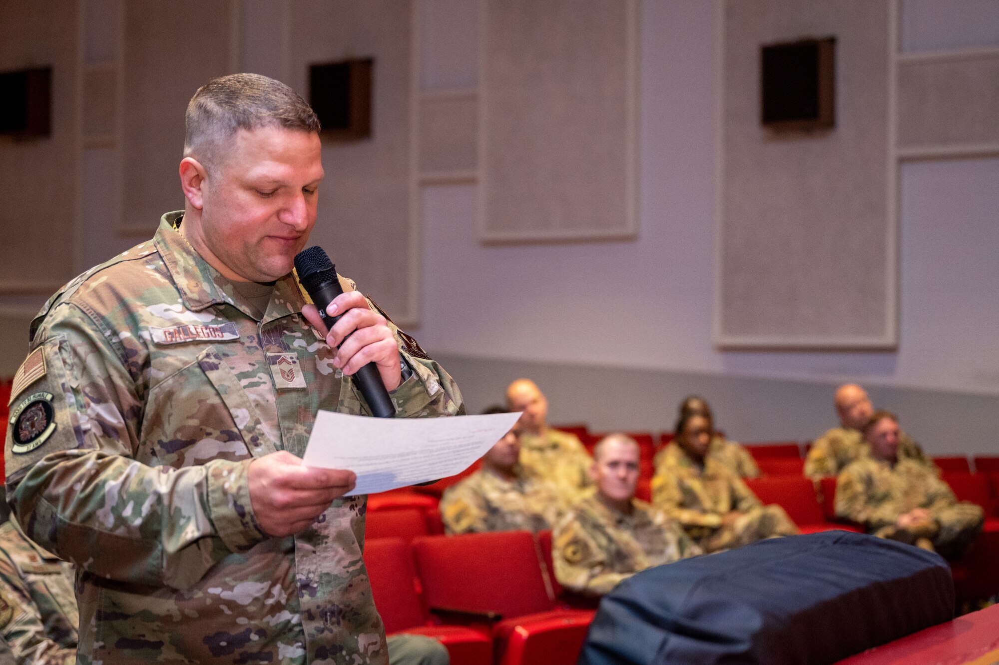 Senior Master Sgt. Preston Gallegos, 37th Aircraft Maintenance Unit superintendent, recites the crew chief oath at Ellsworth Air Force Base, S.D., April 22, 2022. Dedicated crew chiefs are the top performers of the crew chief section and are required to maintain and exceed levels of excellence. (U.S. Air Force photo by Senior Airman Michael Ward)