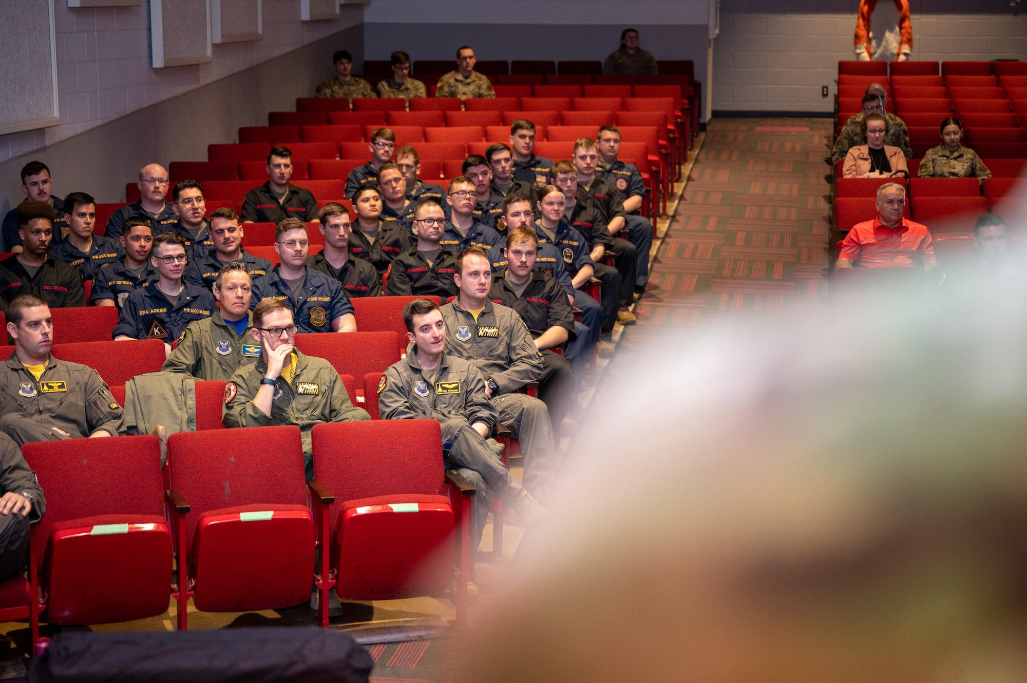 Crew chiefs from the 34th and 37th Bomb Squadrons attend a Dedicated Crew Chief (DCC) ceremony at Ellsworth Air Force Base, S.D., April 22, 2022. The DCC ceremony honors those selected for the role of dedicated crew chief and assistant dedicated crew chief. (U.S. Air Force photo by Senior Airman Michael Ward)