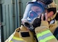 Morgan Gilliam, deputy public affairs officer for Commander, Navy Region Europe, Africa, Central, dons a face mask in preparation for a live fire training exercise on board Naval Support Activity (NSA) Naples’ Support Site, June 26, 2020.