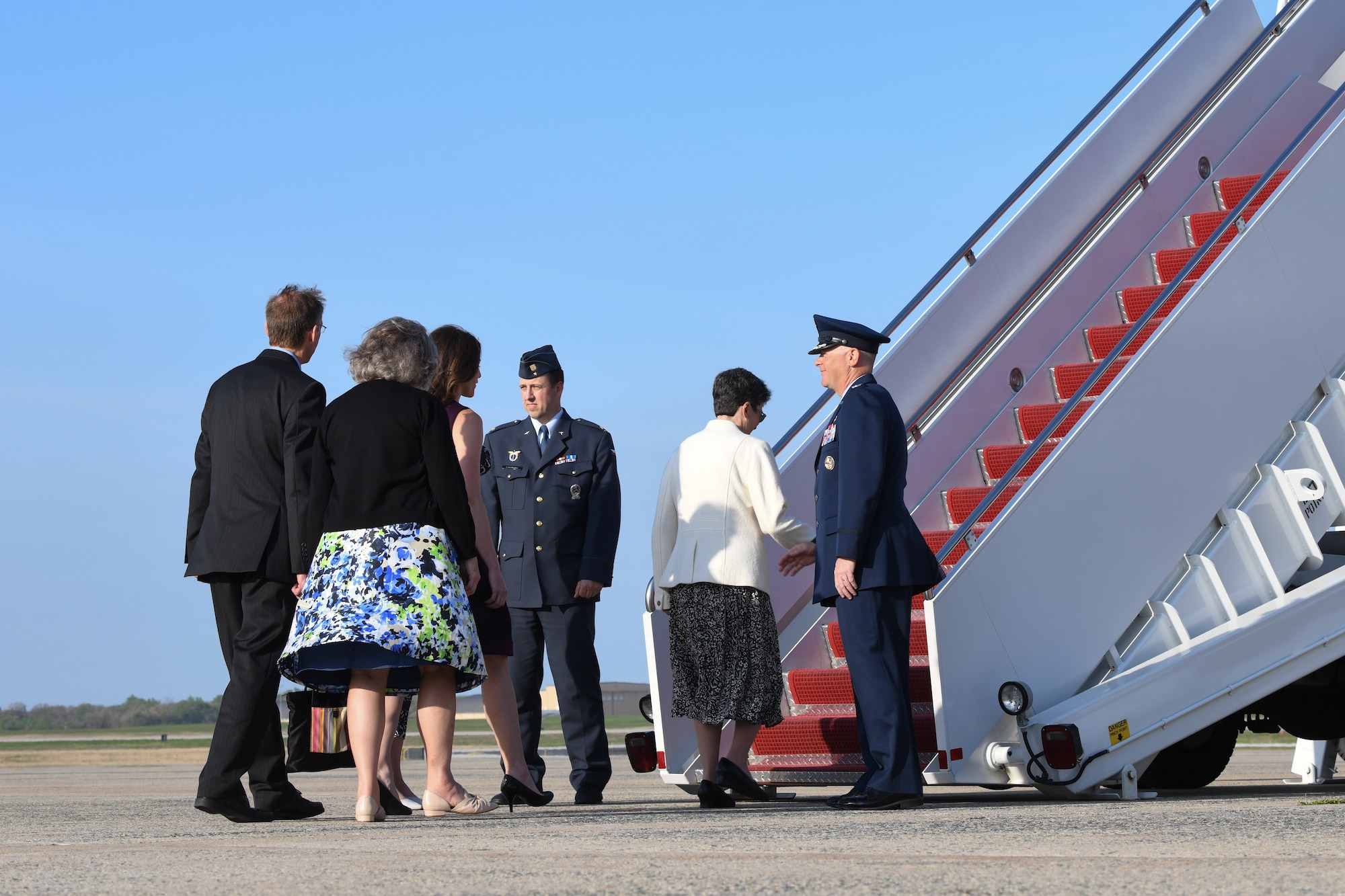 Col. Tyler Schaff, 316th Wing and Joint Base Andrews installation commander, right, greets distinguished guests during the dignified transfer of Brigadier Gen. František Moravec at Joint Base Andrews, Md., April 25, 2022.