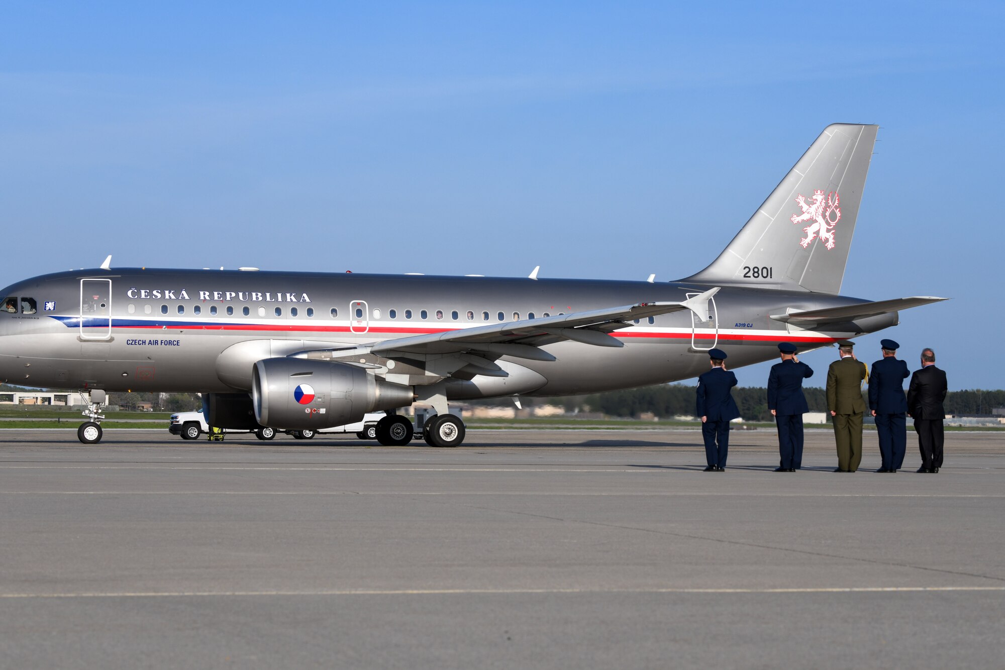 U.S. Air Force and Czech Republic leadership salute the 2801 Czech Air Force Airbus as it departs during the dignified transfer of Brigadier Gen. František Moravec at Joint Base Andrews, Md., April 25, 2022.