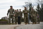 Michigan National Guard  members participate in a team-building exercise during a joint professional development training April 20, 2022, at the Alpena Combat Readiness Training Center, Michigan. The event focused on leadership strategies, professional organizations and some of the MING’s innovative programs.