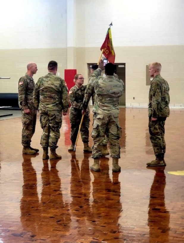 The unit guidon representing an historic exchange of command was handed off to Army Capt. Taylor Davies as she assumed command of Headquarters and Headquarters Battery, 1st Battalion, 623rd Field Artillery Brigade in a ceremony Mar. 27.
