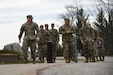 Michigan National Guard  members participate in a team-building exercise during a joint professional development training April 20, 2022, at the Alpena Combat Readiness Training Center, Michigan. The event focused on leadership strategies, professional organizations and some of the MING’s innovative programs.