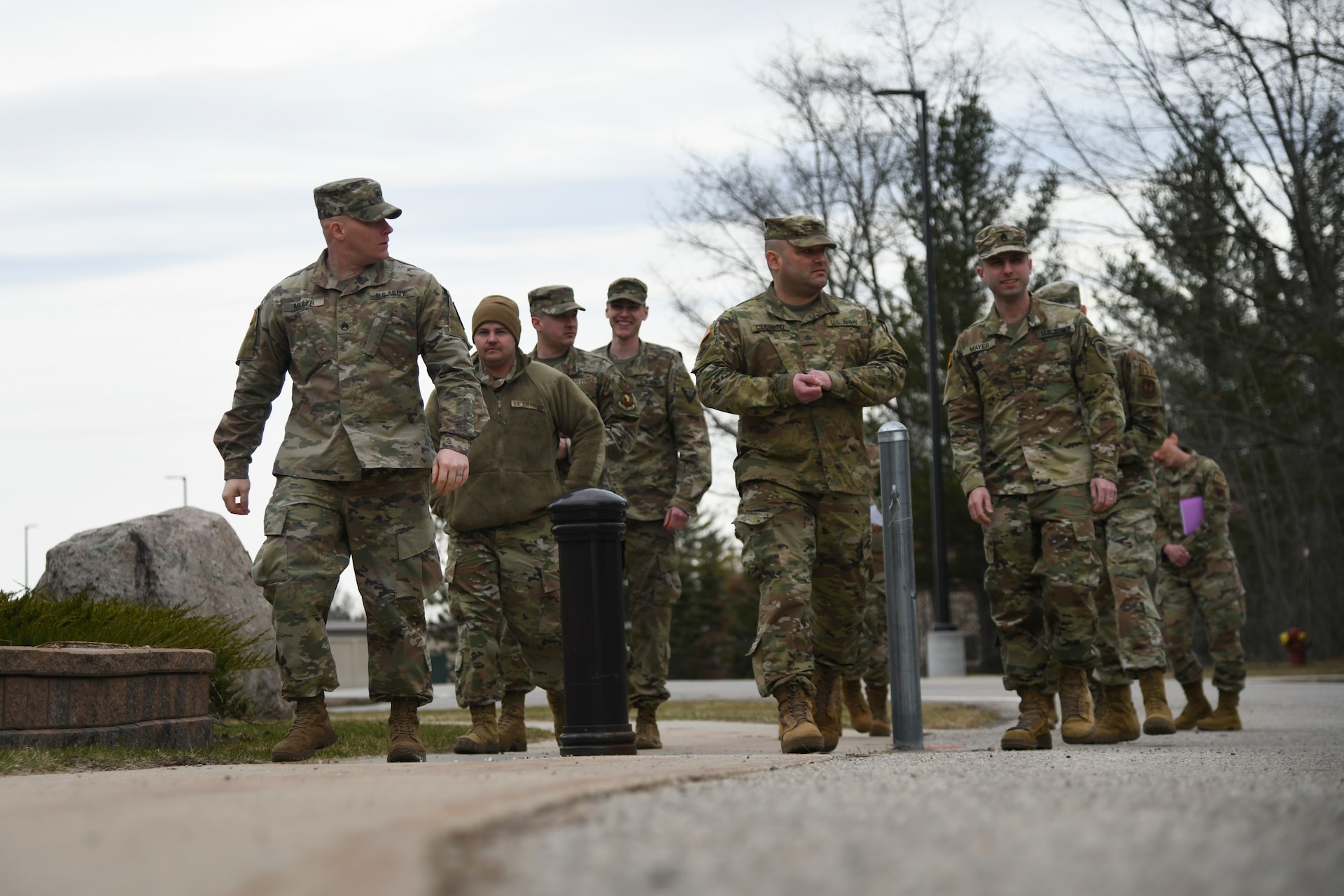 Michigan National Guard  members participate in a team-building exercise during a joint professional development training April 20, 2022, at the Alpena Combat Readiness Training Center, Michigan. The event focused on leadership strategies, professional organizations and some of the MING’s innovative programs.