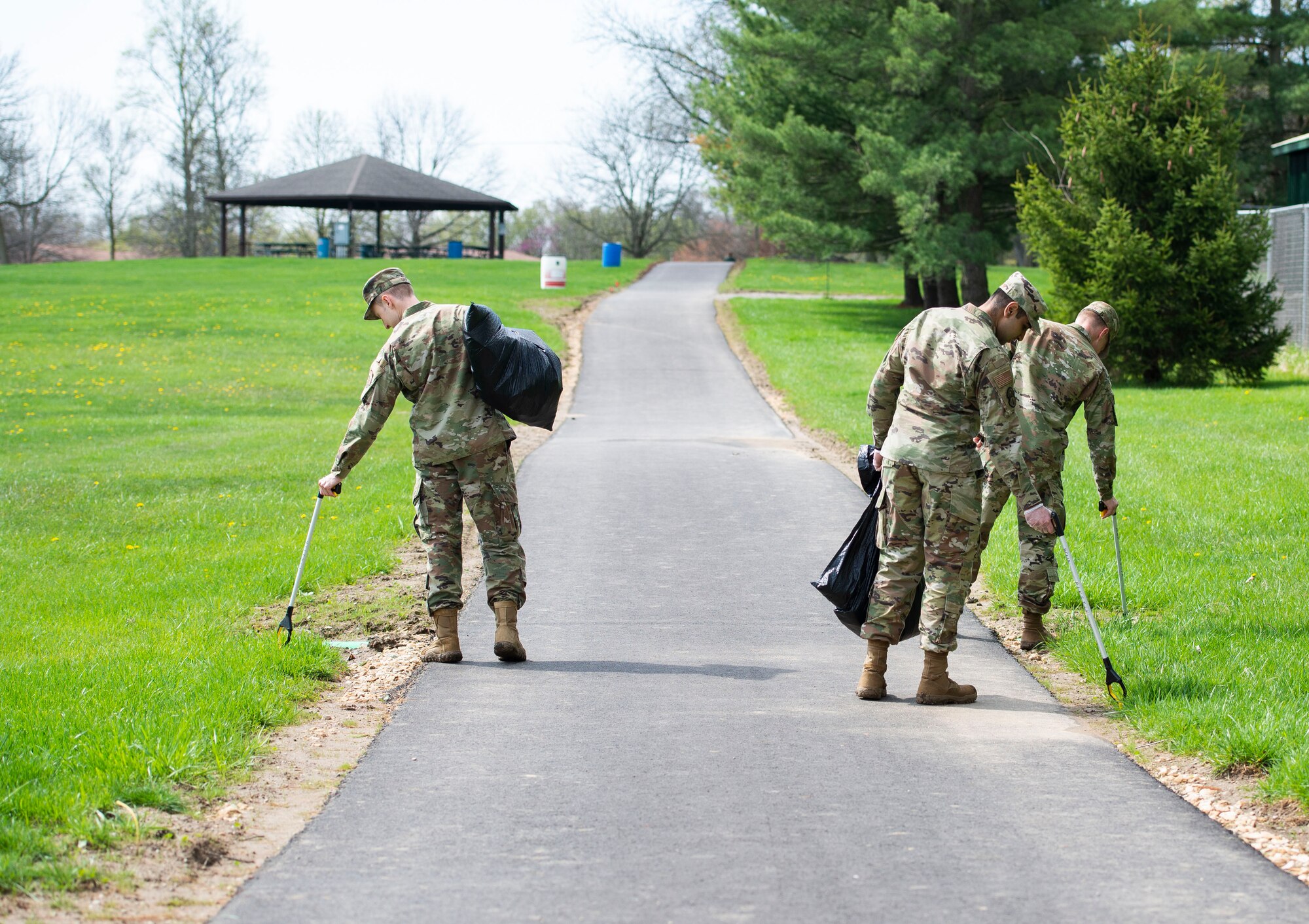 Members of Team Wright-Patt participate in an Earth Day event hosted by Wright-Patterson Air Force Base the City of Fairborn and the Beavercreek Wetlands Association at the Community Park in, Fairborn, Ohio, April 22, 2022. During the event volunteers picked up trash and debris in order to clean up the park. (U.S. Air Force photo by Wesley Farnsworth)