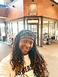 Shannon Midgette, St. Louis MEPS test control officer, takes a selfie during a break from her eight-day-long ride in Washington.