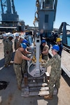 USS Frank Cable Conducts Expeditionary Reload in Australia with USS Springfield Alongside