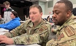 Members of the West Virginia Air National Guard collaborate  during a simulated cyberattack as part of Locked Shields 2022. They joined federal and state agencies and the National Guard on the U.S. team in the world’s largest international cyber defense exercise run virtually by the NATO Cooperative Cyber Defence Centre of Excellence in Tallinn, Estonia, April 19-21, 2022.