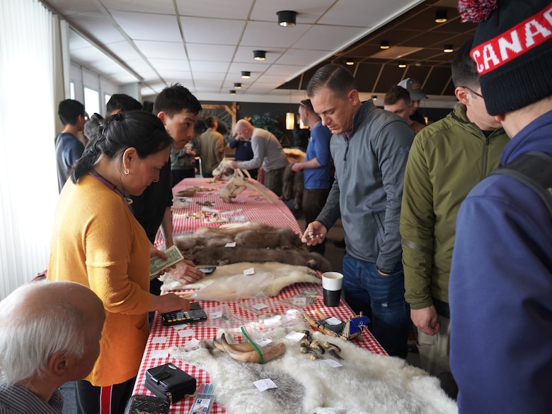 Local Greenland hunters selling crafts at the Greenlandic Craft Fair