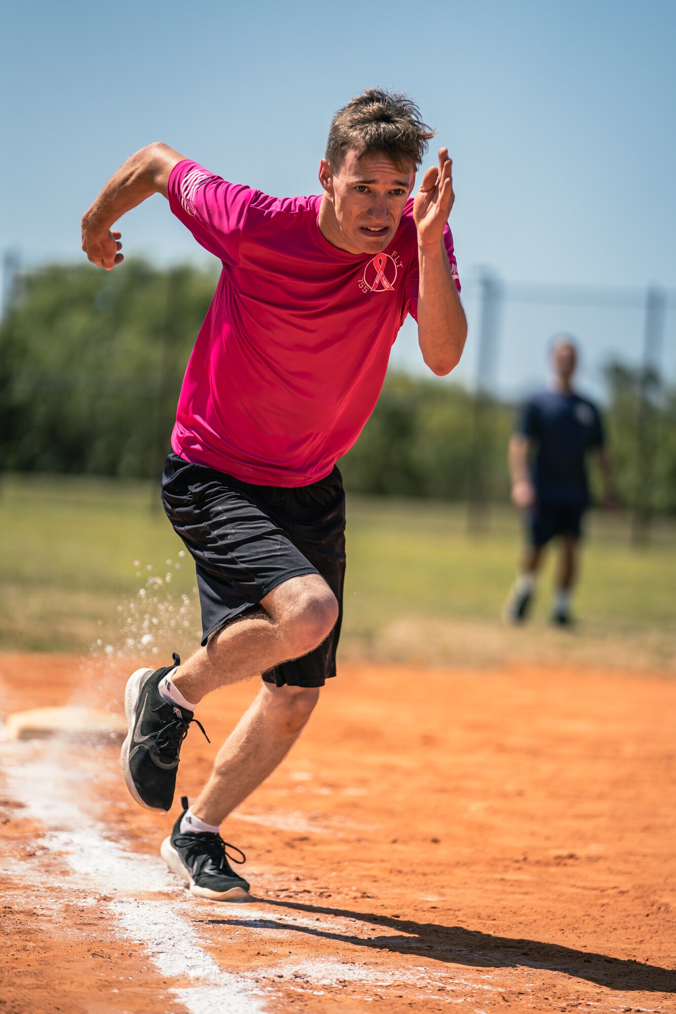 A U.S. Airman assigned to the 6th Air Refueling Wing participates in a kickball game during wingman day at MacDill Air Force Base, Florida, April 22, 2022.