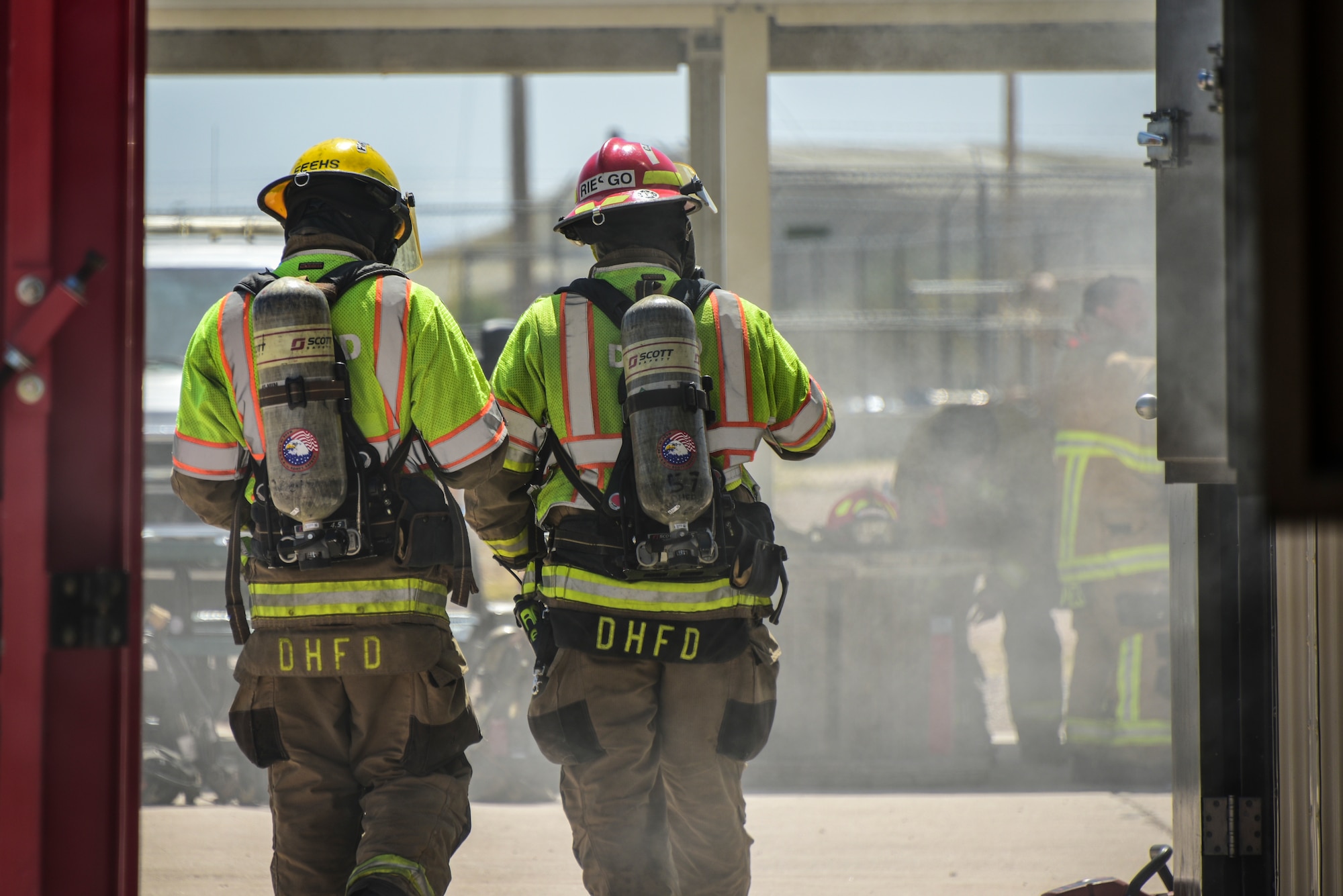 A photo of two firefighters.