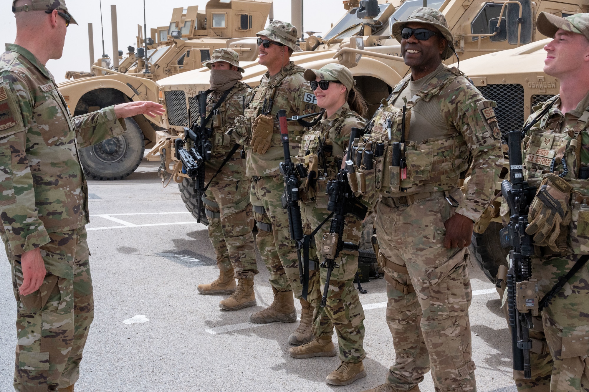 U.S. Air Force Chief Master Sgt. Sean M. Milligan, 332d Air Expeditionary Wing command chief, visits 332nd Expeditionary Security Forces Squadron Airmen at an undisclosed location in Southwest Asia, April 23, 2022. Chief Milligan's immersion visits give him a better understanding of the unique skillsets every Airman brings to the 332d AEW Red Tail team. (U.S. Air Force photo by Tech. Sgt. Lauren M. Snyder)